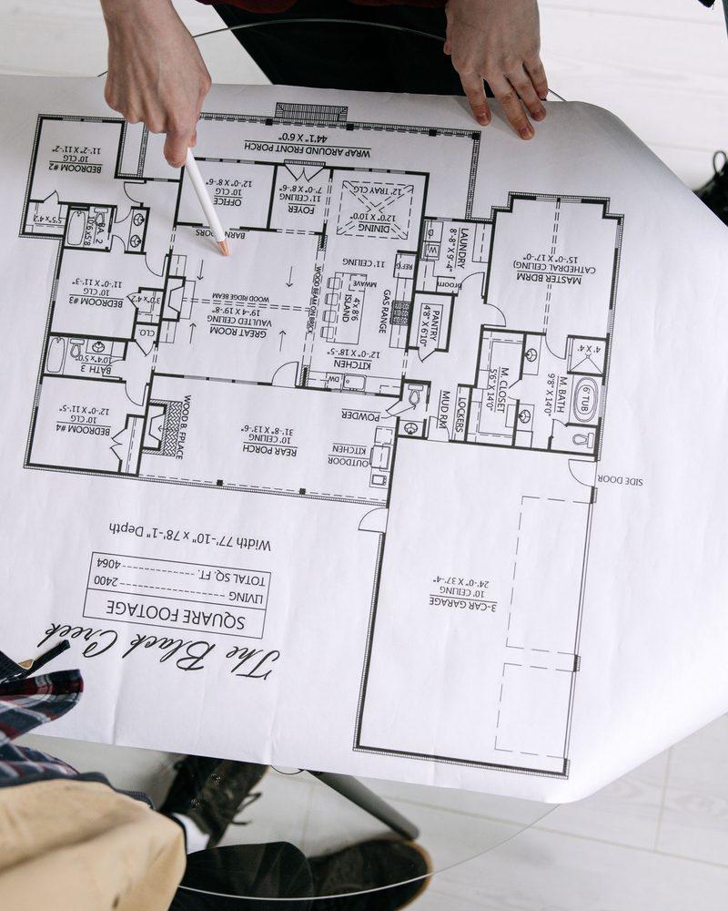 Reviewing house plans together at the table